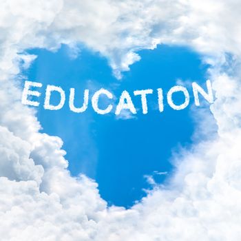 education word on blue sky inside heart cloud form
