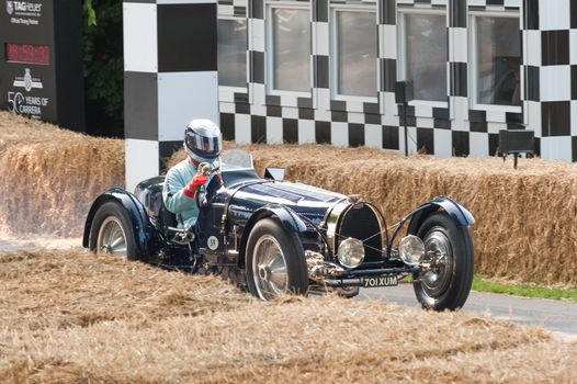 Goodwood, UK - July 13, 2013: Vintage Bugatti Type 59 sports car - circa 1935, racing at the Festival of Speed event held at Goodwood, UK