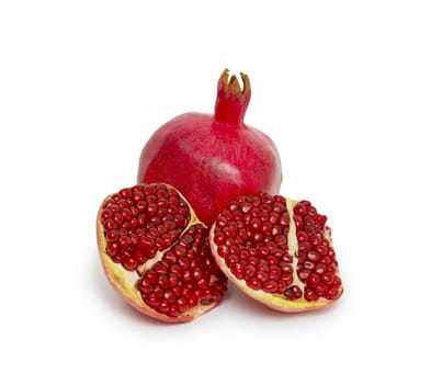 Ripe pomegranate fruit isolated on white background cutout