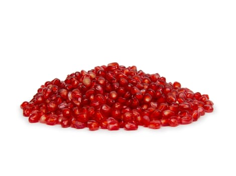 Pomegranate seeds on a white background.