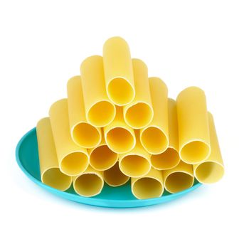 Stack of Raw Cannelloni Pasts on Blue Plate isolated on white background
