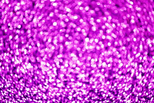 Abstract glitter bokeh holiday purple background