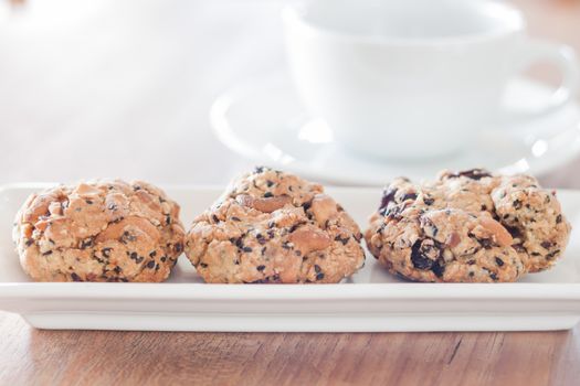 Healthy cookies with coffee cup, stock photo