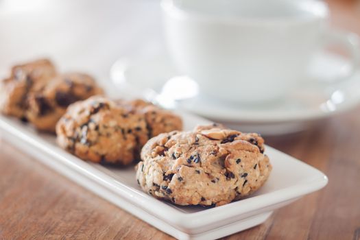 Closeup healthy cookies with coffee cup, stock photo