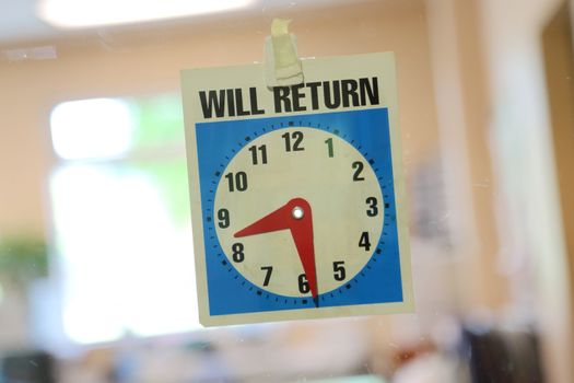 Will return sign with office background 