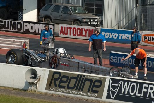 Santa Pod, UK - April 23, 2010: Piers Ward, Top Gear magazine editor and drag racing novice, in the drivers seat researching a beginners guide to extreme motorsport at Santa Pod Raceway., UK