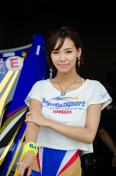 BURIRAM - OCTOBER 5: Unidentified Race Queen of Japan with racing car on display at The 2014 Autobacs Super GT Series Race 7 on October 5, 2014 at Chang International Racing Circuit, Buriram Thailand