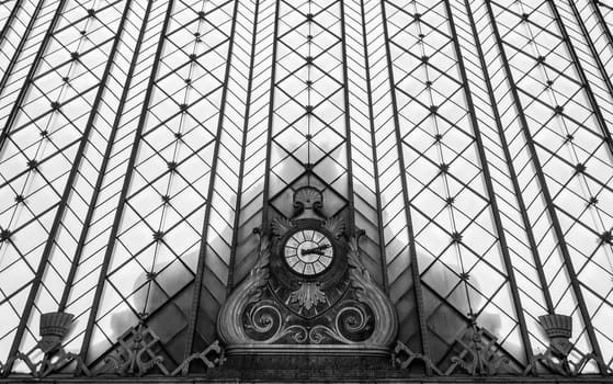 an old clock in the Atocha railways station in the heart of Madrid