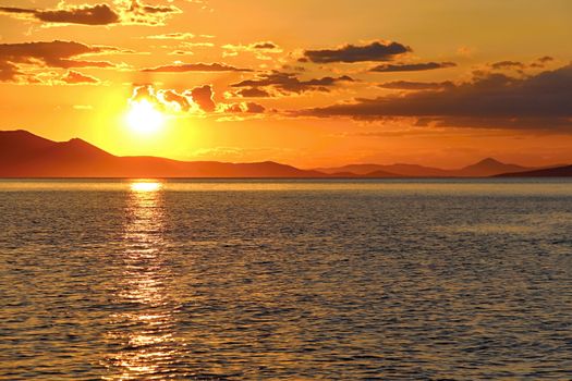 Photo shows Greek sunset over the sea.