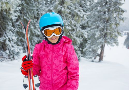 Ski, skier, winter - portrait of lovely girl has a fun on ski