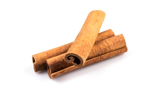 Cinnamon sticks isolated on white background