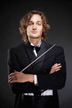 Portrait of a Young Conductor Holding a Baton.