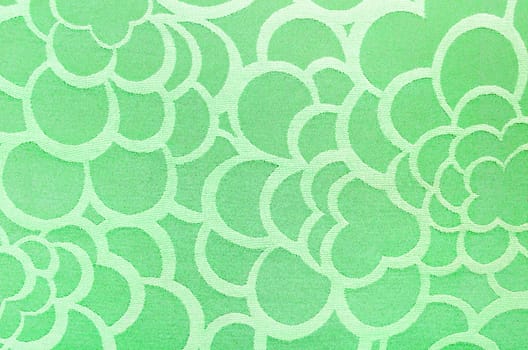 Abstract green circle fabric texture and background.