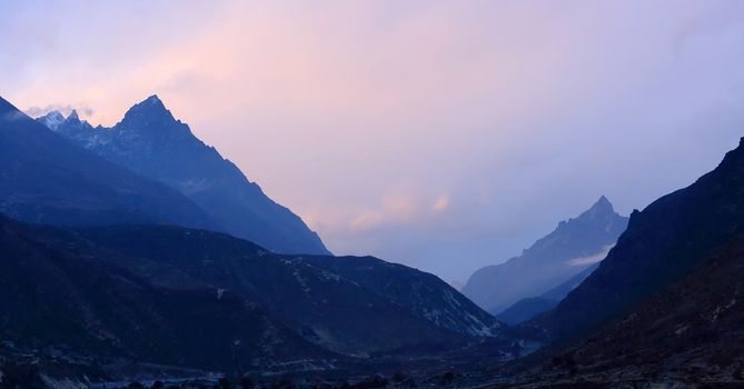 Timelapse sunset in the mountains Himalayas, Thamserku, Kantaiga, Nepal.