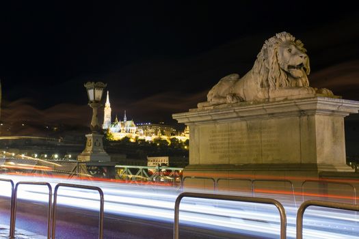 Lion sculpture detail part fo the Chain Bridge over Danube river, Budapest cityscape, Hungary
