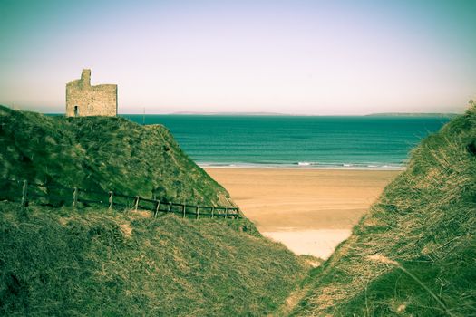 a beautiful fenced path to Ballybunion beach and castle in duotone