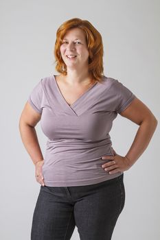 Sexy forty something round woman with a great big smile