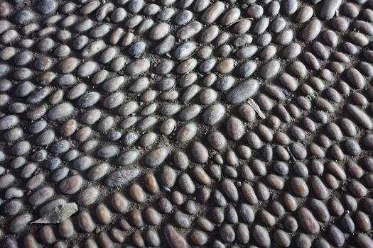 Cobbles in a circular pattern on floor