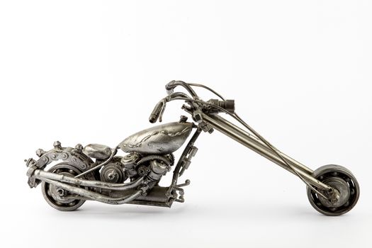 Motorcycle Model is made ������of steel scrap in the car repair shop.