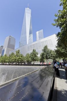 New York City, USA - September 27, 2014 : NYC's September 11 Memorial  in New York Downtown. The memorial was dedicated on the 10th anniversary of the Sept. 11, 2001 attacks.