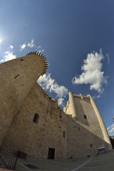 Torija castle through a fisheye lens. Spain. Sunny day with a few clouds in spring.