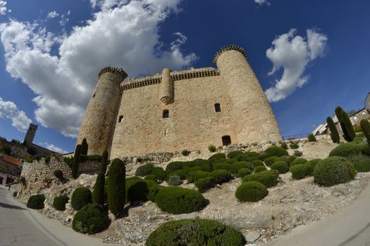 Torija castle through a fisheye lens. Spain. Sunny day with a few clouds in spring.