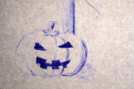 sketch of a halloween pumpkin, with a pen. Backlight