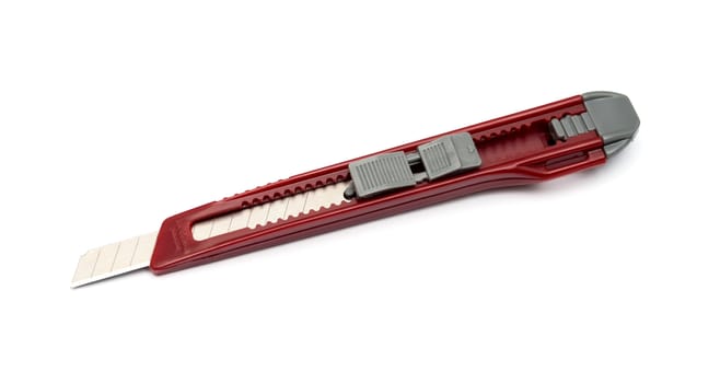 Red paper knife isolated on white background