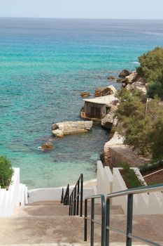 Steps leading down to Cala San Vincente