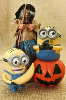 Halloween Minions Playing with Jack the Lantern Pumpkin & Ugly Witches, trick or treat