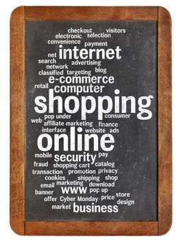 shopping online word cloud on a vintage slate blackboard isolated on white