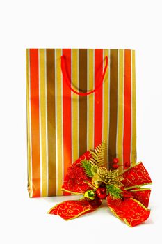 Assorted shopping and gift red paper bags - shopping and holiday concept