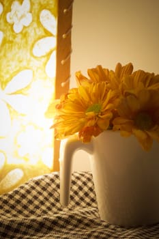 Orange chrysanthemum flower Combined with the lighting of paper lanterns.