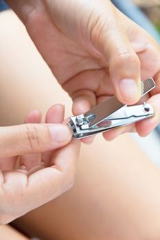 hand manicure with nail clipper Background