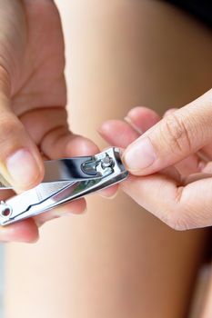 hand manicure with nail clipper Background