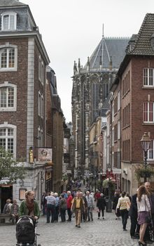 GERMANY,AACHEN - SEPT 29; 2014: People shopping in the streets of Aachen,Aachen is famous because of the dom church next to this terrace