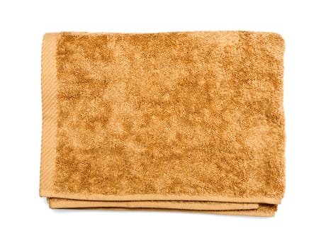 Light brown folded towel on white