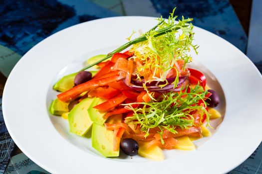 Vegan organic vegetable salad with avocado. Close up