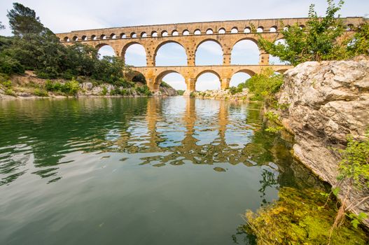 The picturesque nature of southern France with its famous landmark roman bridge Pont du Gard, located near Avignon, France.