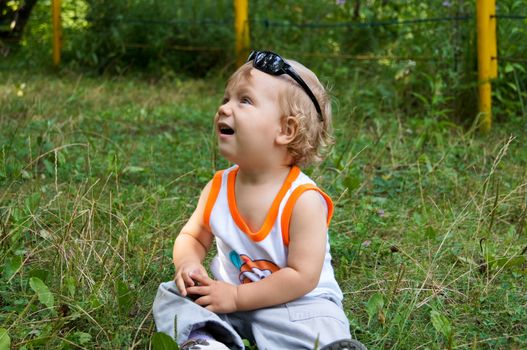 The amusing little boy on walk