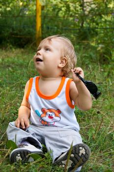 The amusing little boy on walk