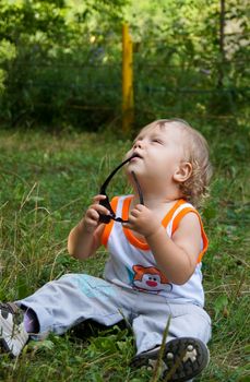 The amusing little boy on walk