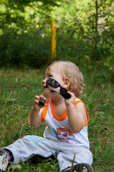 The amusing little boy on walk