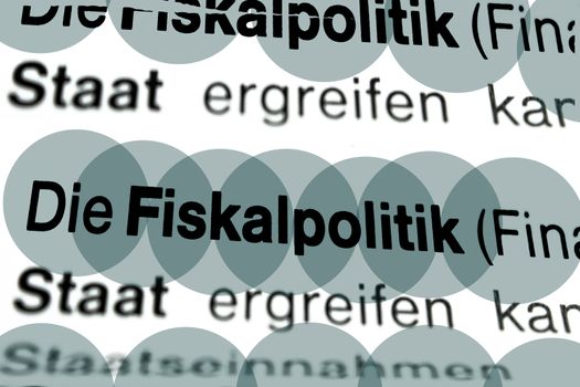 Text auf Seite "Fiskalpolitk" mit markierung horizontale Nahaufnahme