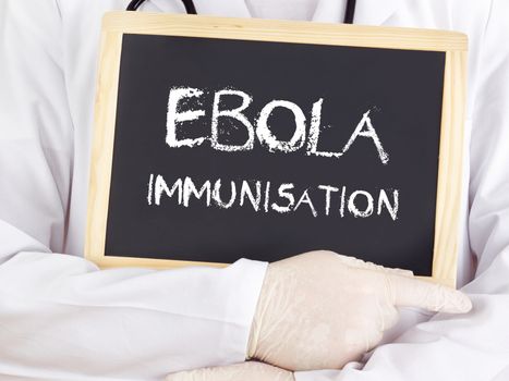 Doctor shows information: Ebola immunisation
