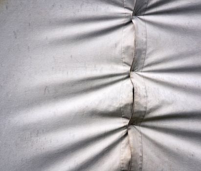 background or texture detail of an old canvas tent