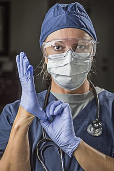 Concerned Female Doctor or Nurse Putting on Protective Facial Wear and Surgical Gloves.