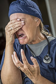 Hysterical Agonizing Crying Female Doctor or Nurse.