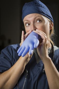 Playful Funny Doctor or Nurse Inflating Surgical Glove.