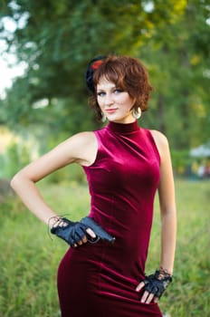 girl with gun on nature